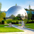 Downtown urban city outdoor mirror polished stainless steel sculpture